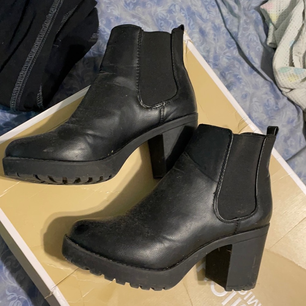Black booties with a heel size 8